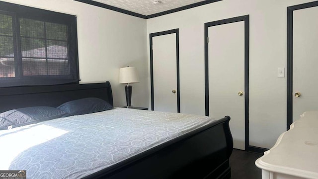 2812 Maple Rd SE, Rome, GA 30161 - bedroom featuring ornamental molding and dark wood finished floors