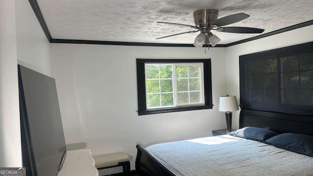 2812 Maple Rd SE, Rome, GA 30161 - bedroom with ornamental molding, a textured ceiling, and a ceiling fan