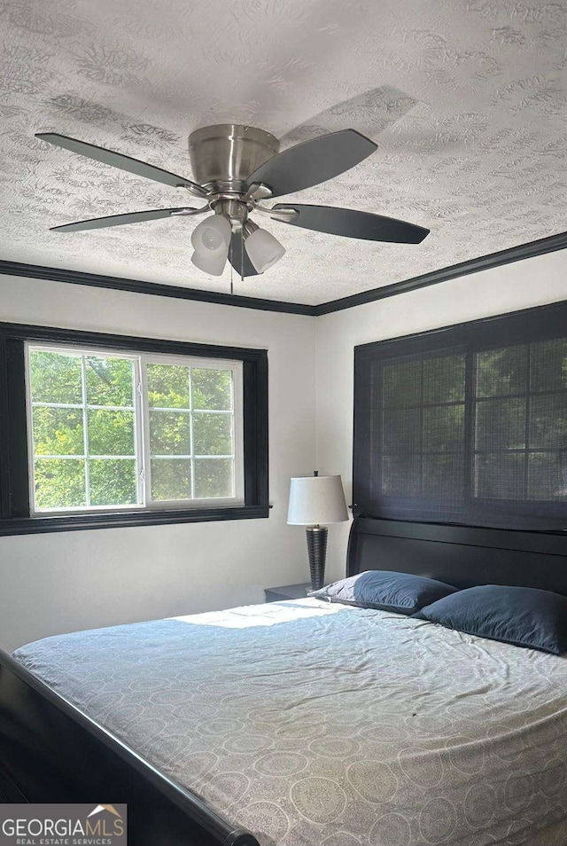 2812 Maple Rd SE, Rome, GA 30161 - bedroom with a textured ceiling and ceiling fan