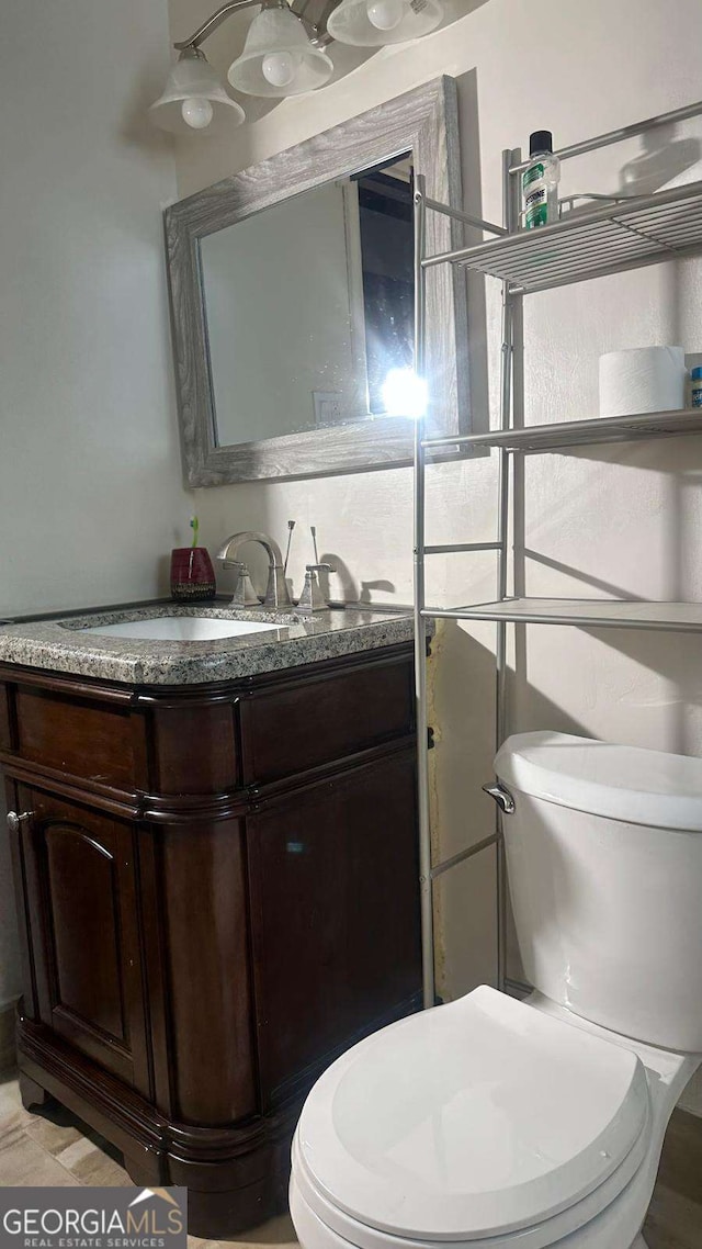 2812 Maple Rd SE, Rome, GA 30161 - bathroom featuring toilet and vanity