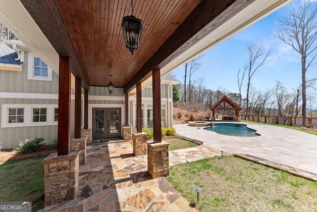 146 David Dr, Tiger, GA 30576 - view of patio / terrace with french doors and a pool with connected hot tub
