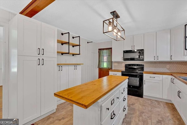 612 Oakcrest Dr, Rockmart, GA 30153 - kitchen featuring black appliances, wood counters, decorative backsplash, white cabinets, and open shelves