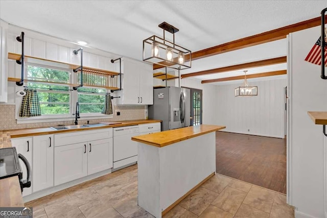 612 Oakcrest Dr, Rockmart, GA 30153 - kitchen featuring butcher block counters, dishwasher, a sink, stainless steel refrigerator with ice dispenser, and open shelves
