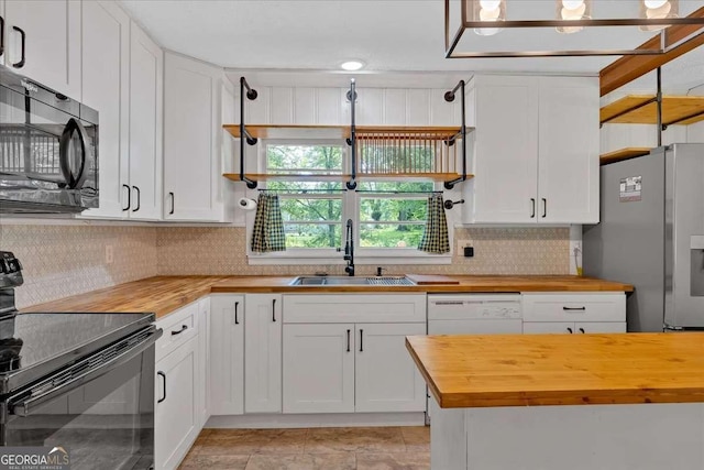 612 Oakcrest Dr, Rockmart, GA 30153 - kitchen featuring wood counters, black appliances, a sink, and backsplash