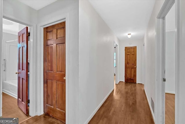 612 Oakcrest Dr, Rockmart, GA 30153 - hallway with wood finished floors and baseboards