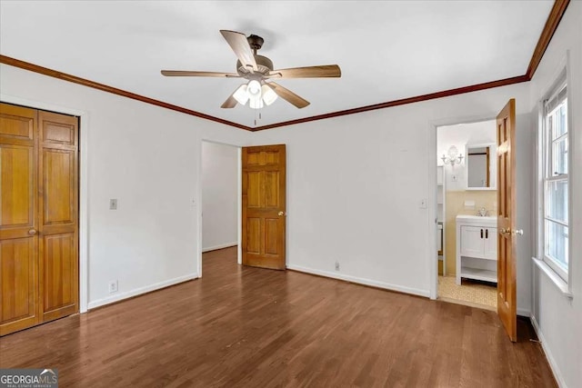 612 Oakcrest Dr, Rockmart, GA 30153 - unfurnished bedroom with wood finished floors, baseboards, ornamental molding, and ceiling fan