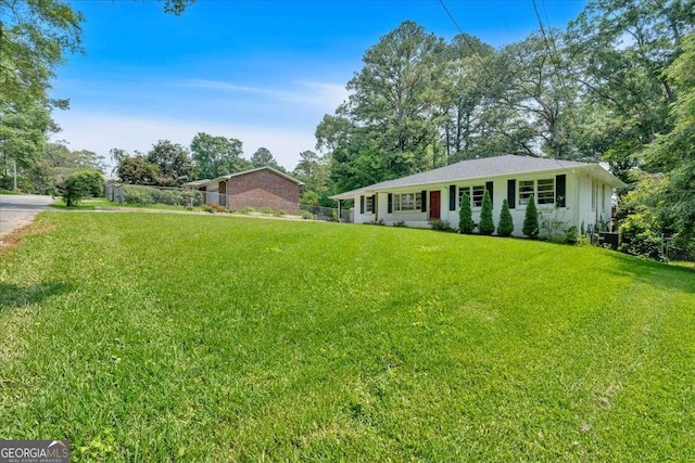 612 Oakcrest Dr, Rockmart, GA 30153 - ranch-style house with a front yard