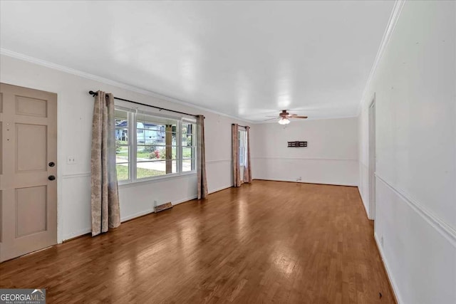 612 Oakcrest Dr, Rockmart, GA 30153 - unfurnished living room with ornamental molding, ceiling fan, and wood finished floors