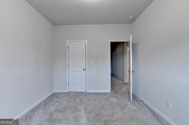 3360 Pickens St, Duluth, GA 30096 - unfurnished bedroom featuring carpet floors and baseboards