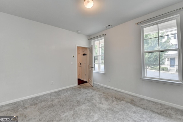 3360 Pickens St, Duluth, GA 30096 - empty room with baseboards and carpet flooring