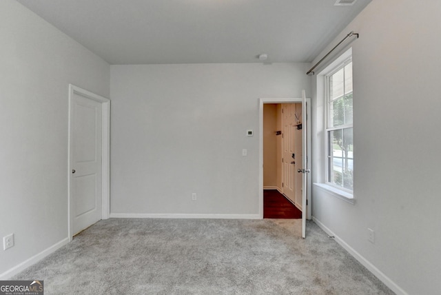 3360 Pickens St, Duluth, GA 30096 - carpeted spare room featuring baseboards