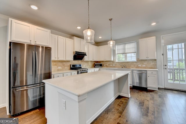 3360 Pickens St, Duluth, GA 30096 - kitchen with stainless steel appliances, a sink, light countertops, white cabinetry, and recessed lighting