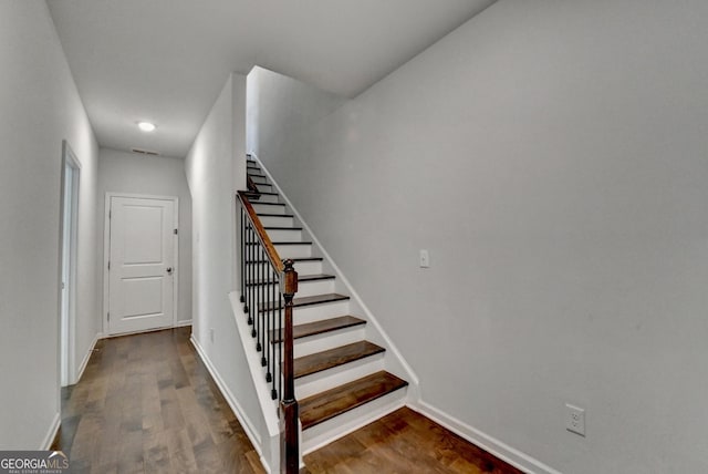 3360 Pickens St, Duluth, GA 30096 - stairway with baseboards, wood finished floors, and recessed lighting