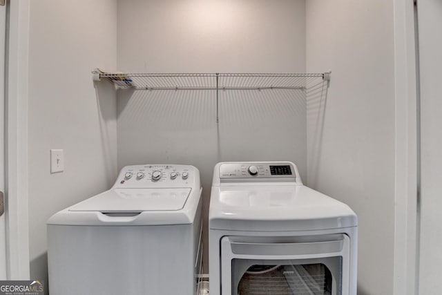 3360 Pickens St, Duluth, GA 30096 - laundry room with washer and clothes dryer