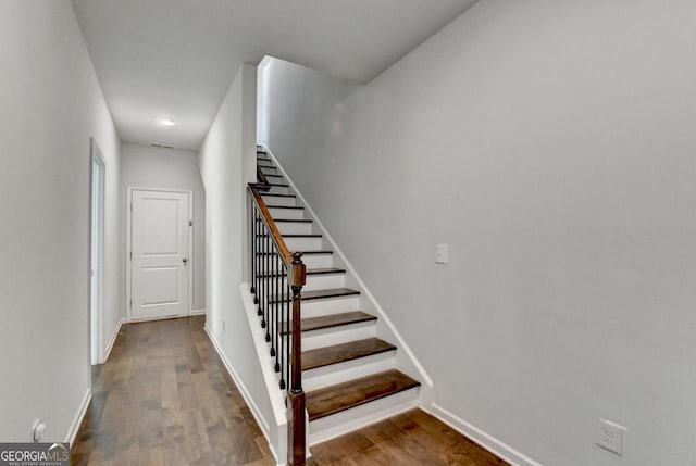 3360 Pickens St, Duluth, GA 30096 - staircase featuring baseboards, wood finished floors, and recessed lighting