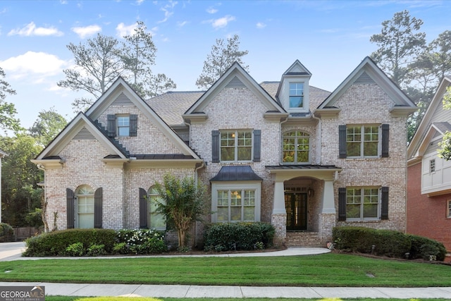 10565 Highgate Manor Ct, Duluth, GA 30097 - view of front of house with a front yard and brick siding