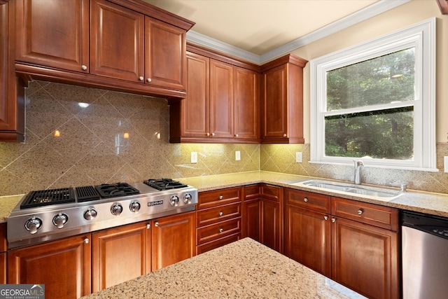 10565 Highgate Manor Ct, Duluth, GA 30097 - kitchen featuring appliances with stainless steel finishes, a sink, light stone counters, backsplash, and crown molding