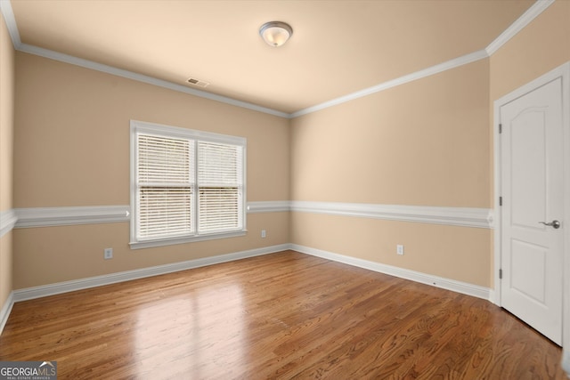 10565 Highgate Manor Ct, Duluth, GA 30097 - unfurnished room featuring wood finished floors, baseboards, and ornamental molding