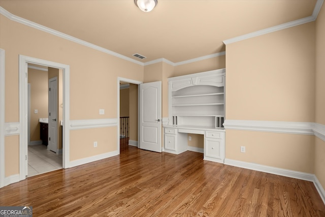 10565 Highgate Manor Ct, Duluth, GA 30097 - unfurnished bedroom featuring light wood-style floors, ornamental molding, and baseboards