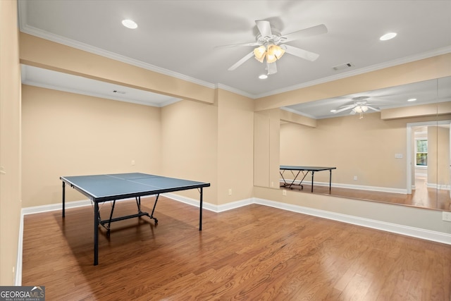 10565 Highgate Manor Ct, Duluth, GA 30097 - recreation room with ceiling fan, wood finished floors, ornamental molding, recessed lighting, and baseboards