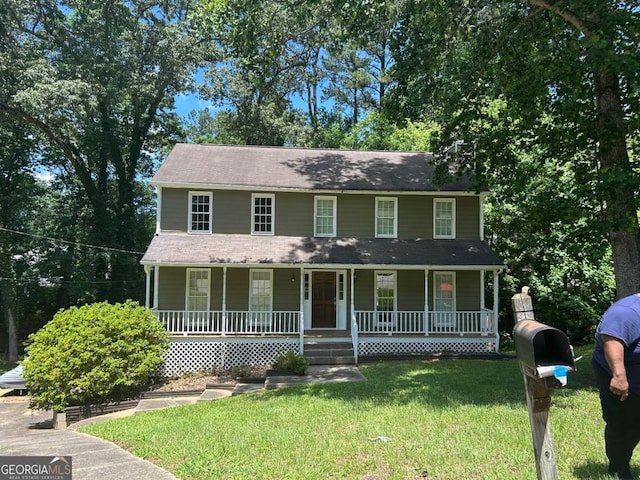 3808 Holy Cross Ct, Decatur, GA 30034 - colonial home featuring a porch and a front lawn
