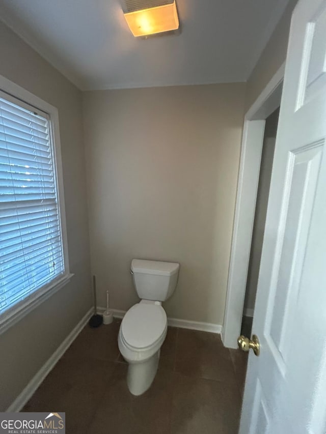 3808 Holy Cross Ct, Decatur, GA 30034 - bathroom with toilet, tile patterned floors, and baseboards