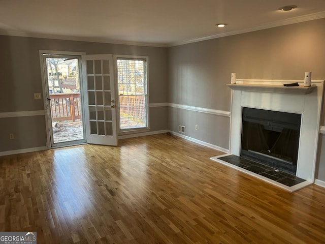 3808 Holy Cross Ct, Decatur, GA 30034 - unfurnished living room featuring a tile fireplace, wood finished floors, baseboards, and ornamental molding