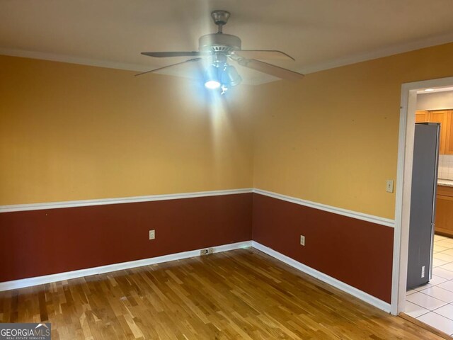 3808 Holy Cross Ct, Decatur, GA 30034 - spare room featuring ceiling fan, light wood-style flooring, crown molding, and baseboards