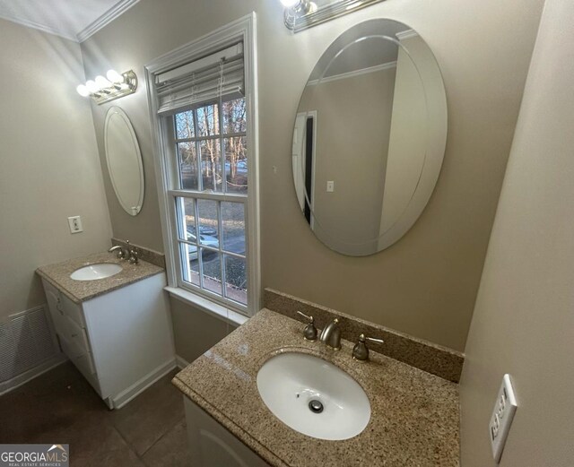 3808 Holy Cross Ct, Decatur, GA 30034 - bathroom featuring two vanities, tile patterned floors, ornamental molding, and baseboards
