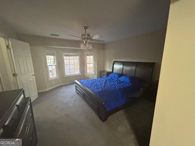 3808 Holy Cross Ct, Decatur, GA 30034 - bedroom with carpet flooring, baseboards, and a ceiling fan