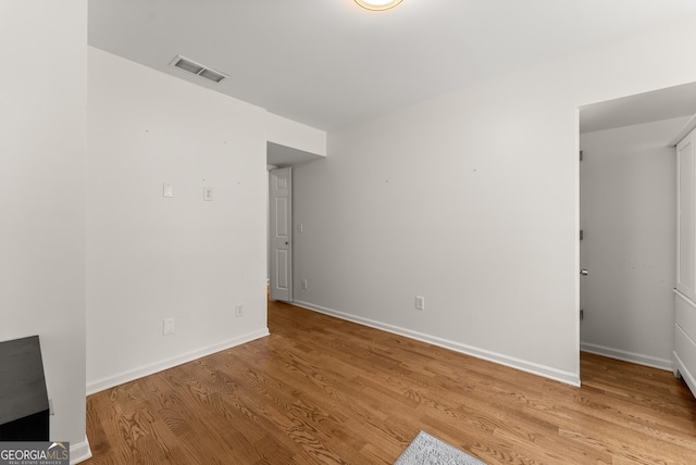 2605 Fort Apachee Trl, Dacula, GA 30019 - unfurnished bedroom with light wood finished floors and baseboards