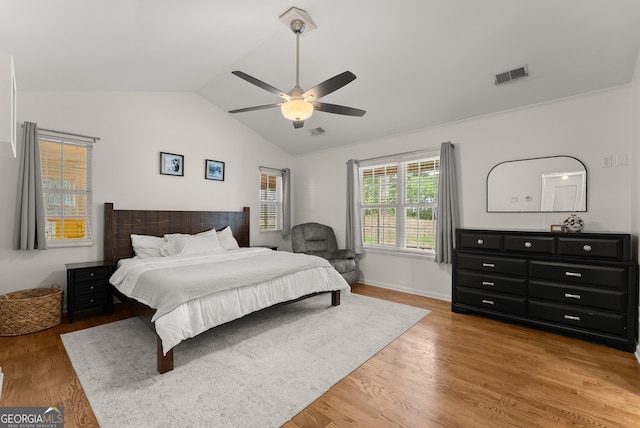 2605 Fort Apachee Trl, Dacula, GA 30019 - bedroom featuring lofted ceiling, light wood finished floors, and a ceiling fan