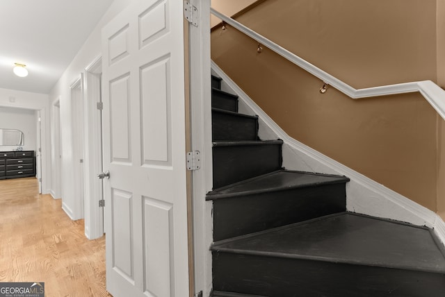 2605 Fort Apachee Trl, Dacula, GA 30019 - staircase featuring wood finished floors