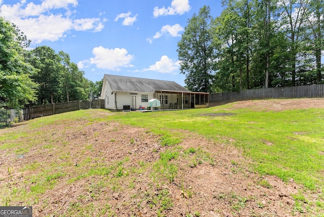 2605 Fort Apachee Trl, Dacula, GA 30019 - view of yard with central air condition unit and a sunroom