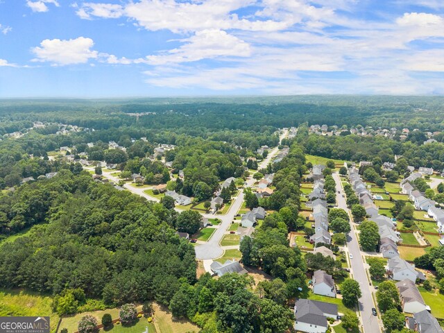 2605 Fort Apachee Trl, Dacula, GA 30019 - aerial perspective of suburban area featuring a forest