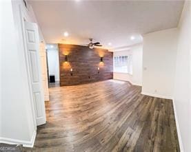 241 Sarann Ct NW, Lilburn, GA 30047 - unfurnished living room featuring wood finished floors, baseboards, and recessed lighting
