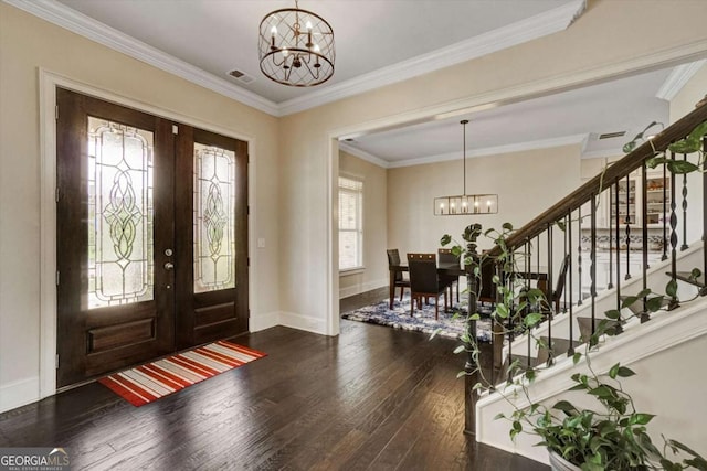 1835 Henley Way, Alpharetta, GA 30009 - entrance foyer with a chandelier, hardwood / wood-style flooring, stairway, baseboards, and crown molding