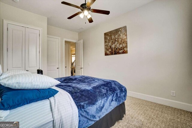 1835 Henley Way, Alpharetta, GA 30009 - bedroom featuring baseboards, carpet floors, a closet, and ceiling fan