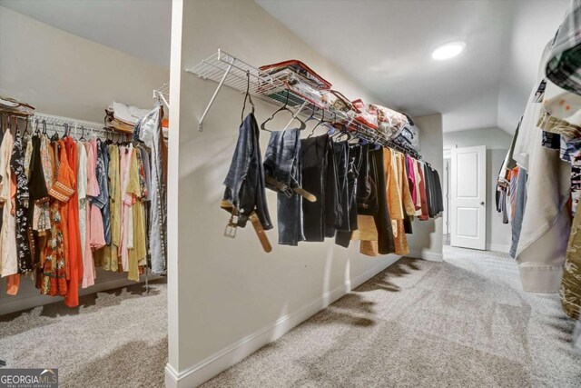 1835 Henley Way, Alpharetta, GA 30009 - walk in closet featuring carpet flooring and lofted ceiling