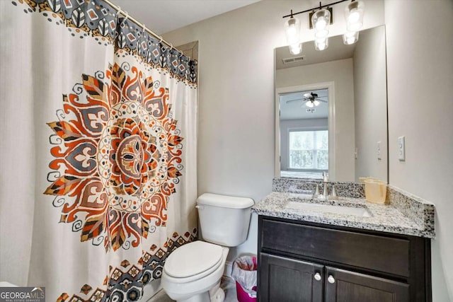 1835 Henley Way, Alpharetta, GA 30009 - bathroom with toilet, vanity, curtained shower, and ceiling fan