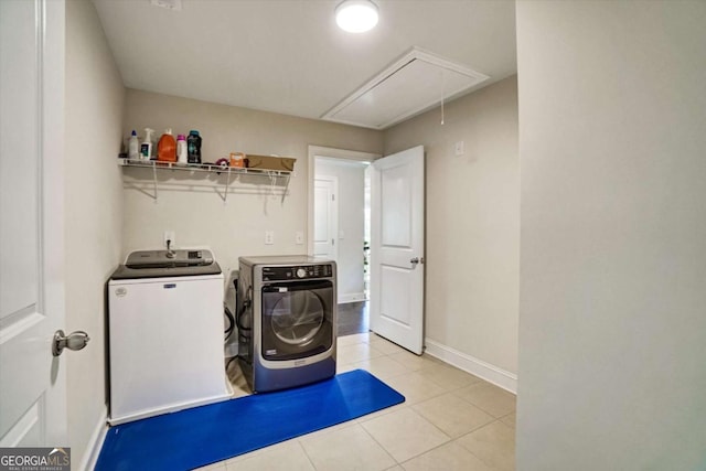 1835 Henley Way, Alpharetta, GA 30009 - washroom with attic access, washer and clothes dryer, light tile patterned flooring, and baseboards