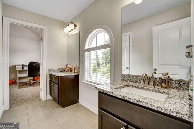 1835 Henley Way, Alpharetta, GA 30009 - bathroom featuring two vanities, baseboards, and tile patterned floors