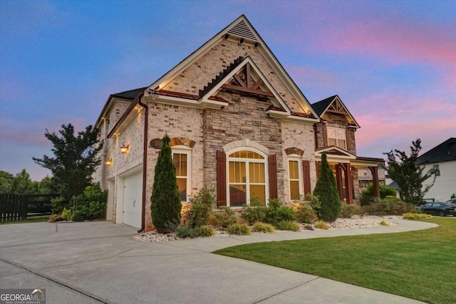 1835 Henley Way, Alpharetta, GA 30009 - view of front of property featuring stone siding, concrete driveway, a front lawn, and a garage