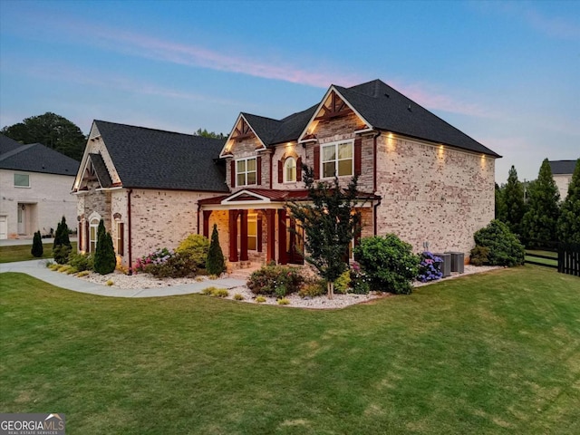1835 Henley Way, Alpharetta, GA 30009 - view of front of property featuring brick siding, central air condition unit, a porch, and stone siding