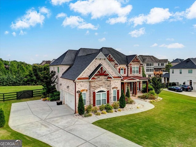 1835 Henley Way, Alpharetta, GA 30009 - view of front of property featuring stone siding, concrete driveway, and a garage