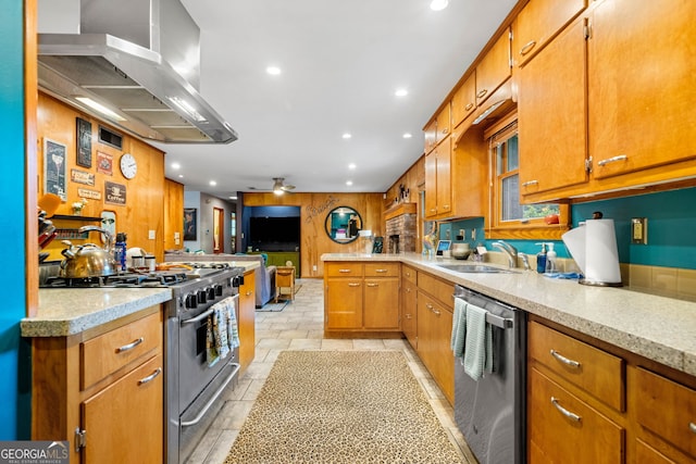 1138 Berkeley Rd, Avondale Estates, GA 30002 - kitchen featuring stainless steel appliances, a sink, wall chimney range hood, recessed lighting, and brown cabinets