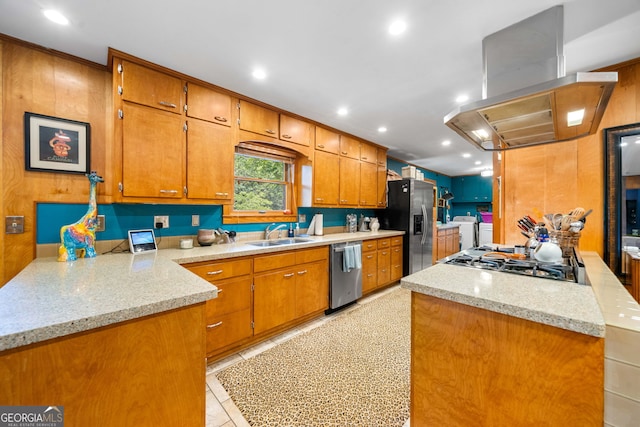 1138 Berkeley Rd, Avondale Estates, GA 30002 - kitchen featuring washing machine and clothes dryer, stainless steel appliances, exhaust hood, brown cabinetry, and recessed lighting