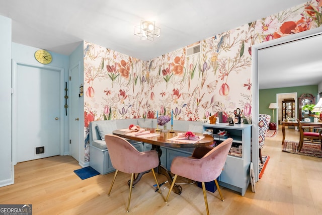 1138 Berkeley Rd, Avondale Estates, GA 30002 - dining room featuring wallpapered walls and wood finished floors