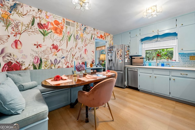 1138 Berkeley Rd, Avondale Estates, GA 30002 - dining area featuring wallpapered walls and light wood-type flooring