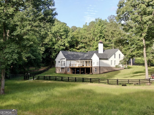 128 Golden Hills Dr, Woodstock, GA 30189 - rear view of house featuring a wooden deck and a chimney